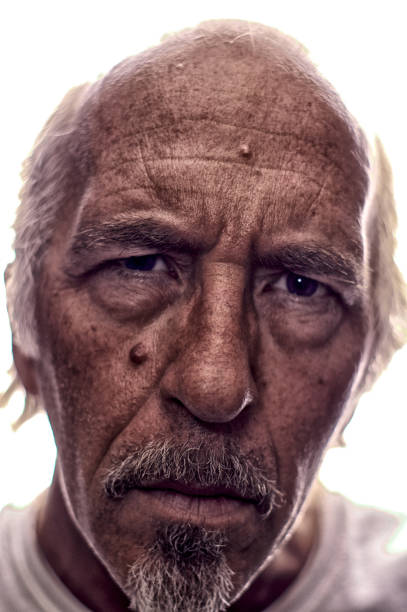 istock backlit Stylized portrait of older man with goatee 1065184446