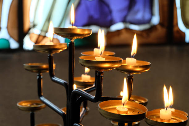 Church Candles candles burning in a church wachs stock pictures, royalty-free photos & images