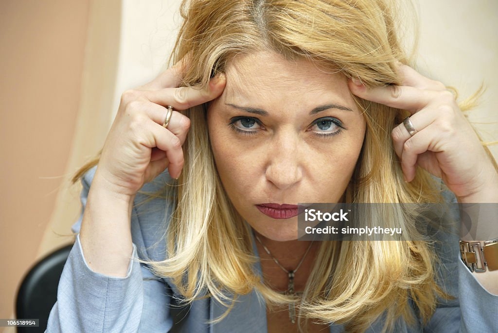 Businesswoman headache  Shaking Head Stock Photo