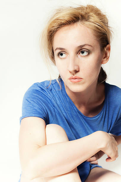 istock beautiful young woman with blue eyes on white background 106519549