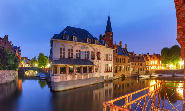 istock Old town at night, Bruges, Belgium 1065217486