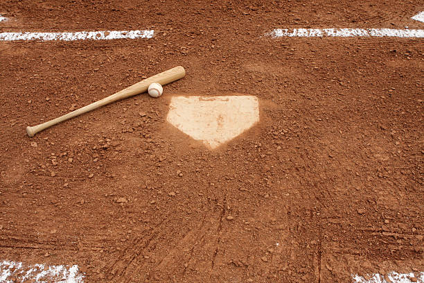 istock Baseball & Bat near Home Plate 106521970