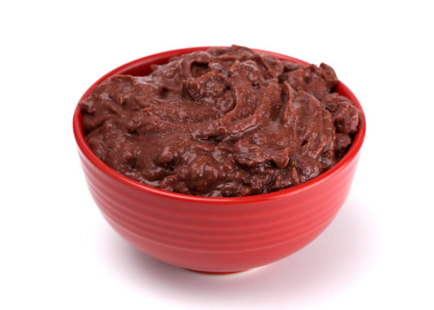 istock A Bowl of Black Bean Dip on a White Background 1065221140
