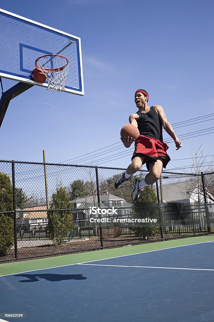 Skilled jugador de baloncesto - Foto de stock de Baloncesto libre de derechos