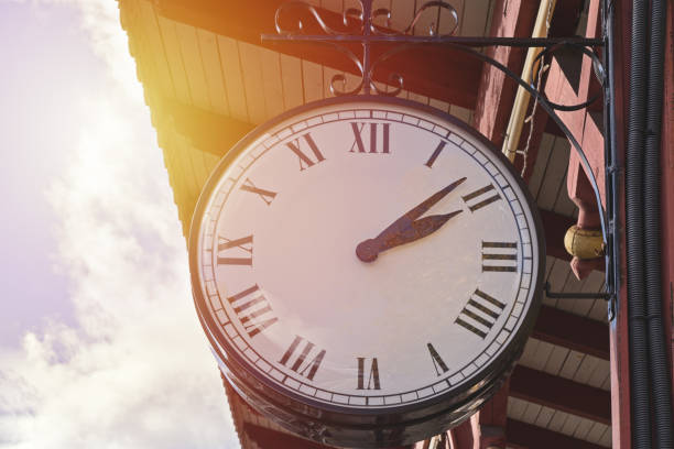 istock Vintage station clock on natural background 1065223420