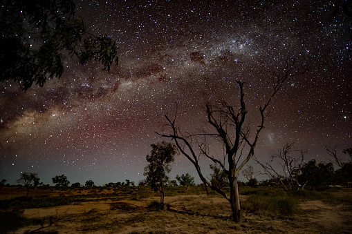 Seen is the Milky Way stitching over the sky in outback Queensland