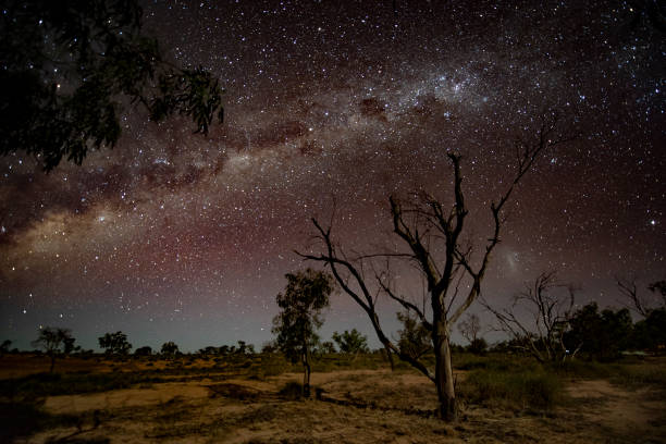 Outback Milky Way Seen is the Milky Way stitching over the sky in outback Queensland ian stock pictures, royalty-free photos & images