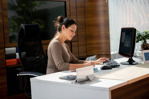 istock Business woman working at the office 1065238424