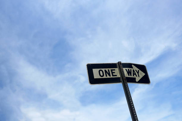istock Blue Sky and One Way Sign 1065239166