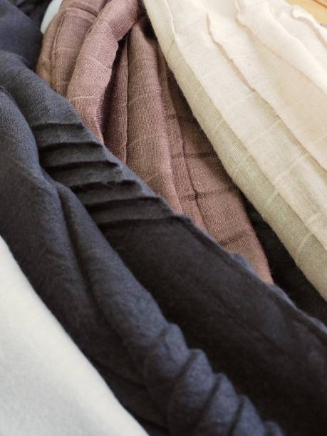 istock Black, brown, beige, gray autumn scarf 1065241112