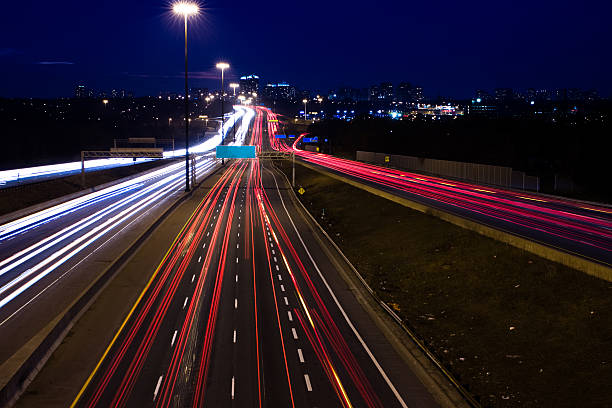 istock Busy highway with red and white light trails 106525062