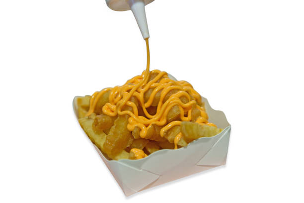 Fries potato chips in a box topping with Custard or mayonnaise