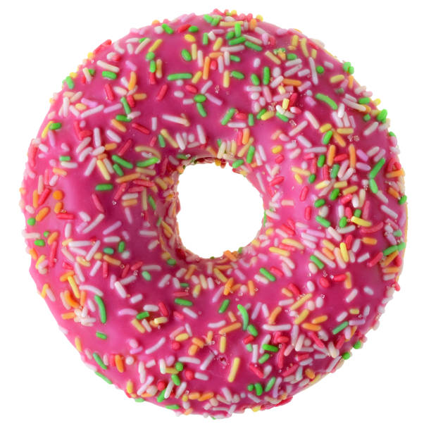 istock Strawberry donut covered with pink icing Isolated 1065254904