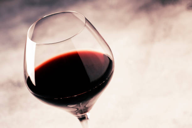 Red wine from grape varieties merlot in glass