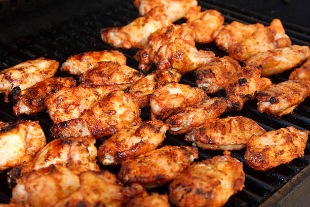 close up shot of grilling chicken meat. 