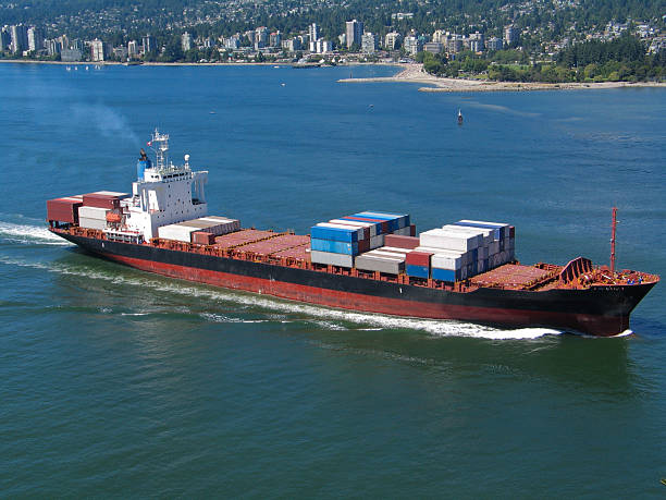 istock Large container ship with Vancouver city skyline as a background 106526330
