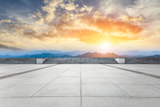 istock Empty floor and green mountain with beautiful clouds at sunset 1065266498
