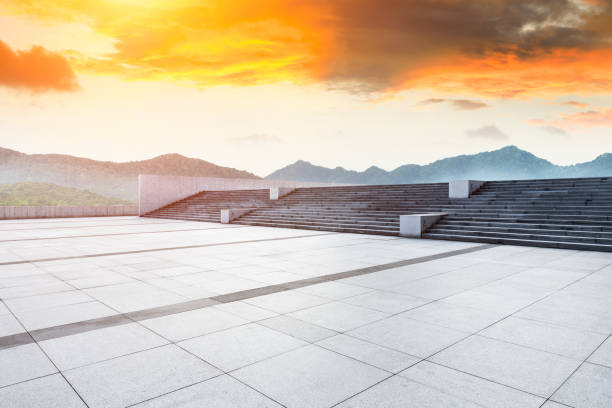 istock Empty floor and green mountain with beautiful clouds at sunset 1065267596