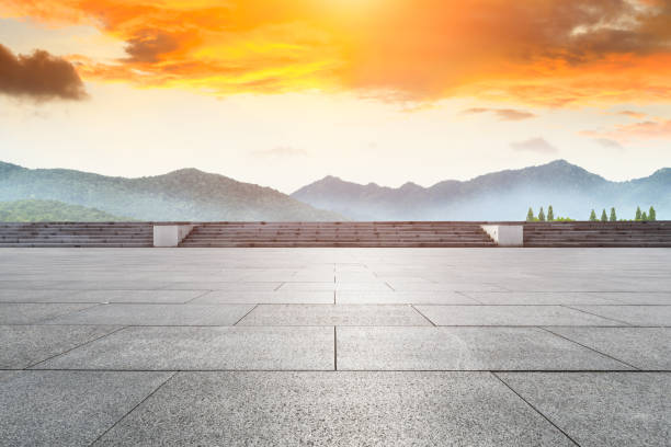 istock Empty floor and green mountain with beautiful clouds at sunset 1065267672