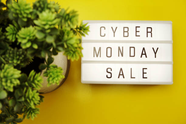 istock cyber monday sale flat lay top view on yellow background 1065271244