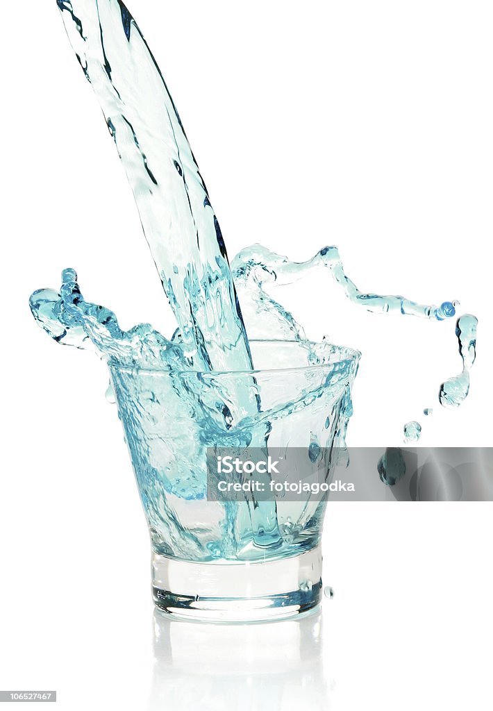 Glass with splashing blue drink  Alcohol - Drink Stock Photo