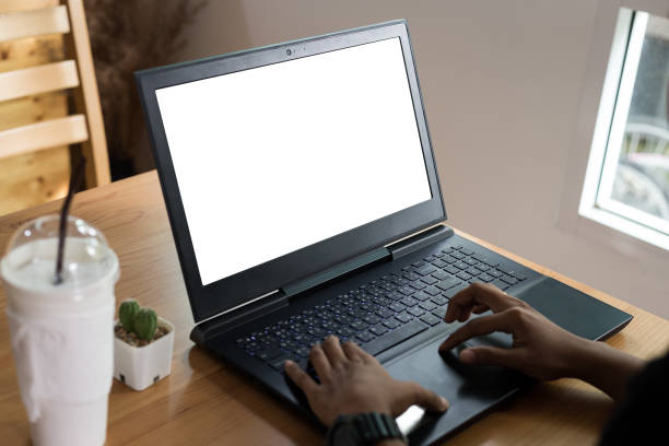 istock young  woman working  laptop computer  on wood desk ,Empty notebook 1065276686