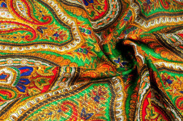 istock Texture, background, pattern. Woman's headscarf, shawl. Bright colors. Paisley. Indian themes. Fabric for clothes Fabric 100% silk. One Fashion Soft Women's Shawl Red Georgette Female Swarf 1065282494