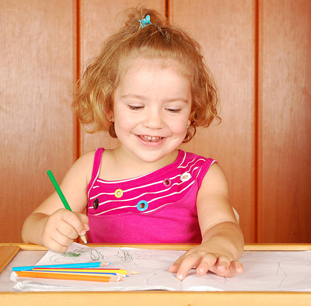 istock little girl fun and drawing 106529523