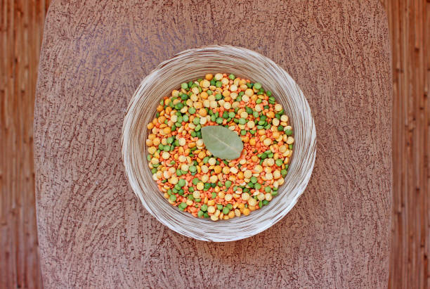 plate with peas and lentils on brown