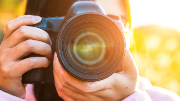 istock Young woman photographing 1065303700