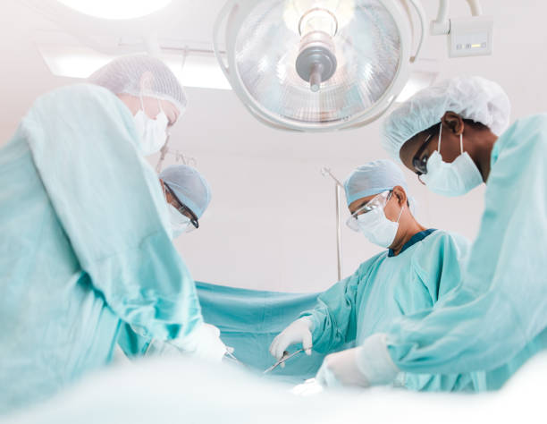 istock Surgeon and assistants during surgery in operation room 1065306294