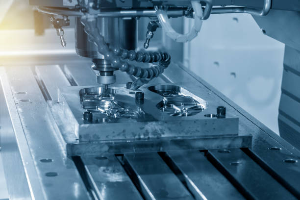 istock The CNC milling machine cutting the shoe injection mold part. 1065307088