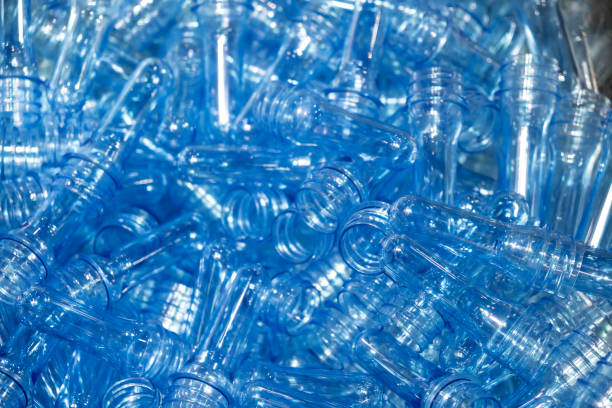 istock The preform shape of PET bottle for blowing plastic bottle . 1065307358