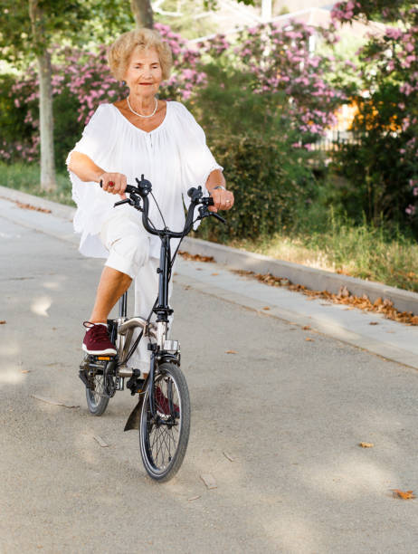 istock Elderly woman going to biking 1065309816