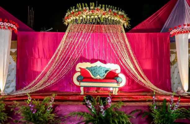 Indian Wedding Stage.Indian wedding decoration. Indian beautiful marriage decoration with flowers