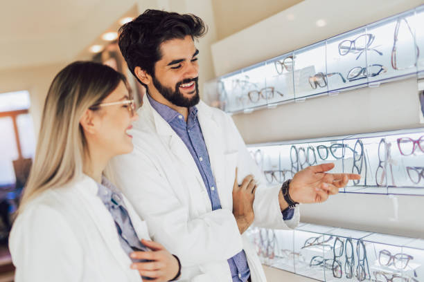 istock Optician selling glasses at the optics 1065324386