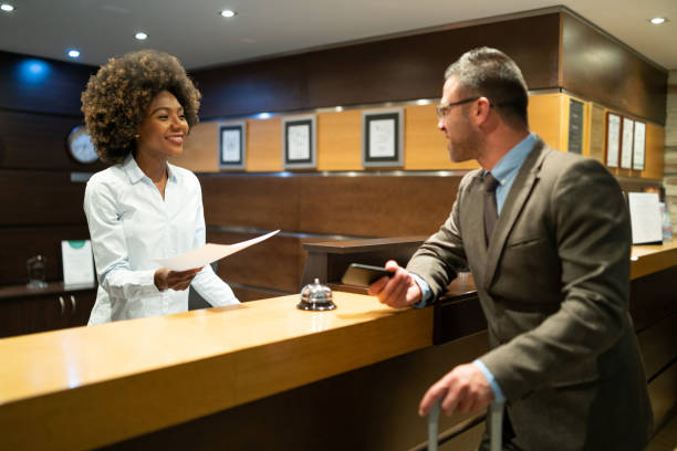 istock Businessman arriving in hotel 1065328408