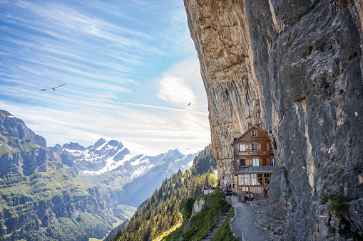 Ebenalp, Switzerland - June 11, 2017: Ebenalp Alps with its famous cliff inn Aescher - an attractive recreation mountain region in Canton Appenzell, Switzerland