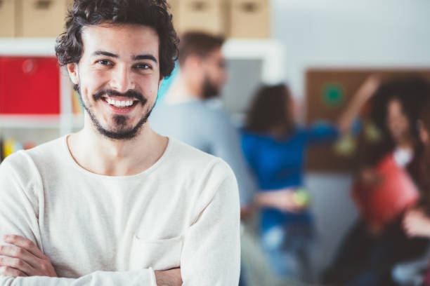 istock Smiling man's portrait in the office 1065338780