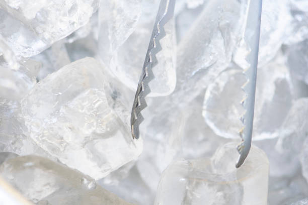istock ice and ice Tong in an ice bucket. 1065339246