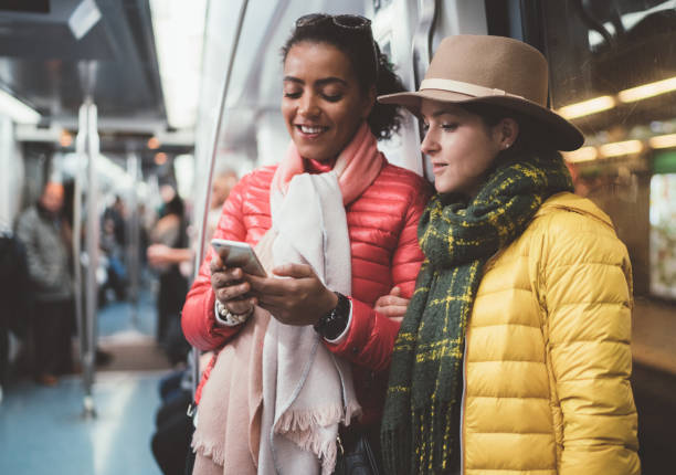 istock Women texting at the subway train,Barcelona trip 1065339706