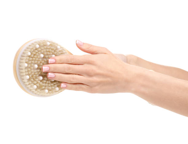 istock The brush from cellulite in hands 1065344544
