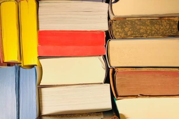 istock Colorful books including red, yellow and blue paper 1065344908