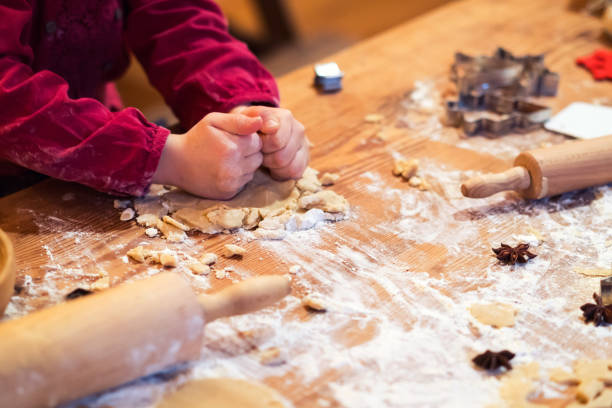 istock Real christmas bakery - Child is making christmas cookies 1065345770
