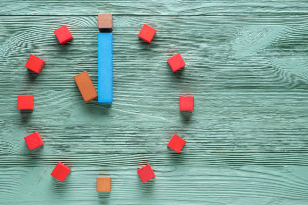 istock Colorful clock from wooden cubes, eleven hour. 1065346754