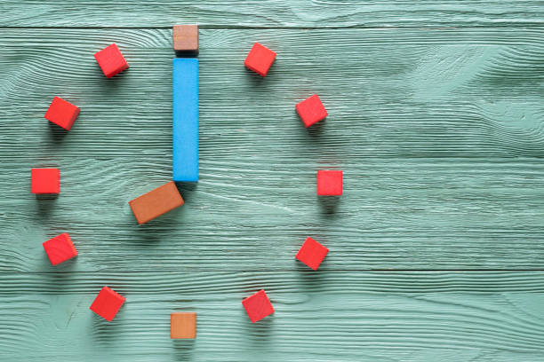 istock Colorful clock from wooden cubes, eight hour. 1065346760