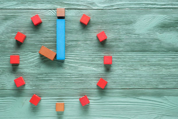istock Colorful clock from wooden cubes, ten hour. 1065346768