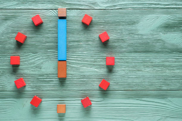 istock Colorful clock from wooden cubes, six hour. 1065346774