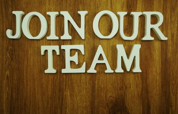 istock join our team made from wooden cubes with letters alphabet 1065347772