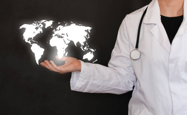 istock Female doctor and glowing world map 1065352070